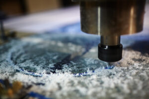 "OMTech FC-105 fiber laser cutting machine in operation"