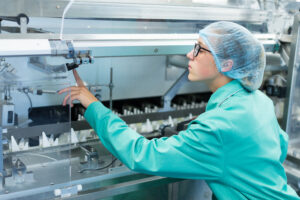 Automotive parts being cut with advanced laser cutting technology.